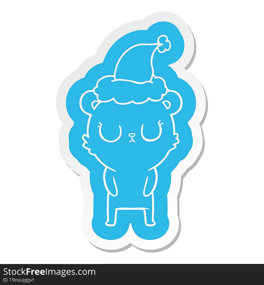 peaceful cartoon  sticker of a bear wearing santa hat