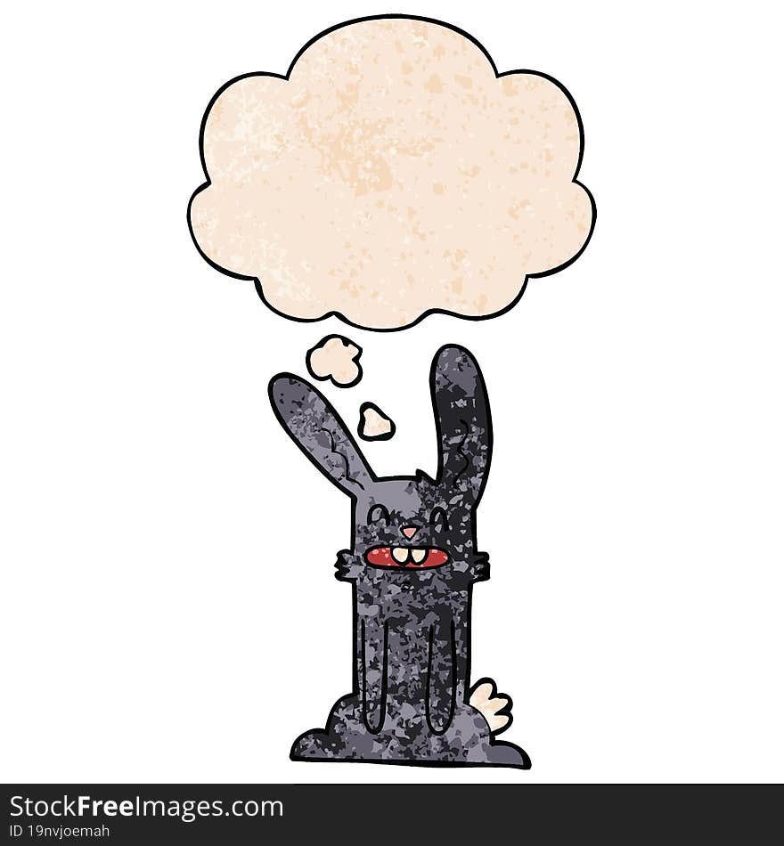 cartoon rabbit with thought bubble in grunge texture style. cartoon rabbit with thought bubble in grunge texture style