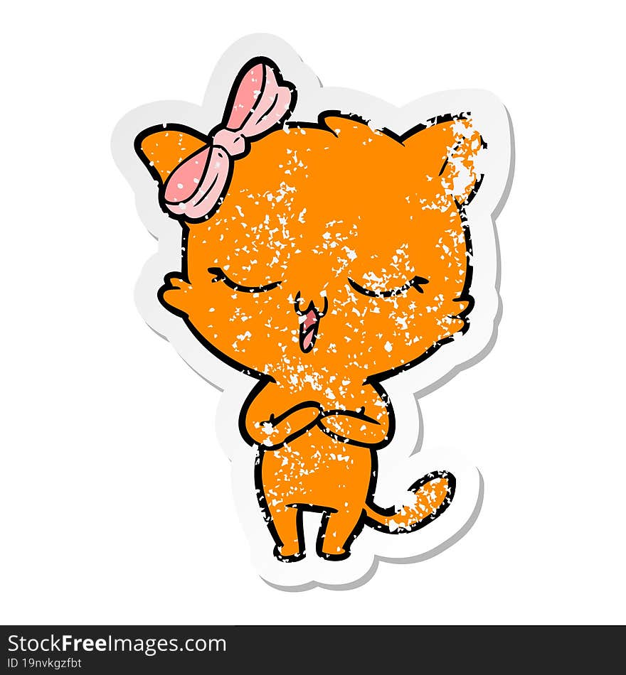 distressed sticker of a cartoon cat with bow on head