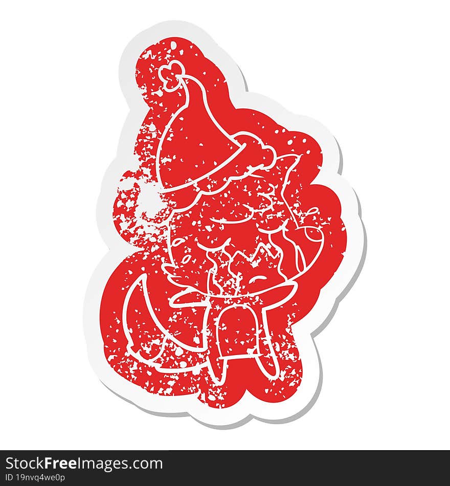 crying fox quirky cartoon distressed sticker of a wearing santa hat