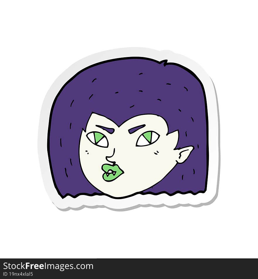 sticker of a cartoon vampire face