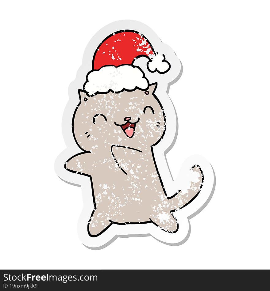 distressed sticker of a cute cartoon christmas cat