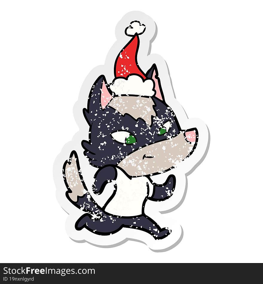 Friendly Distressed Sticker Cartoon Of A Wolf Wearing Santa Hat