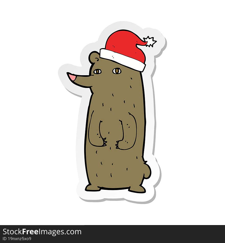 sticker of a cartoon bear in xmas hat