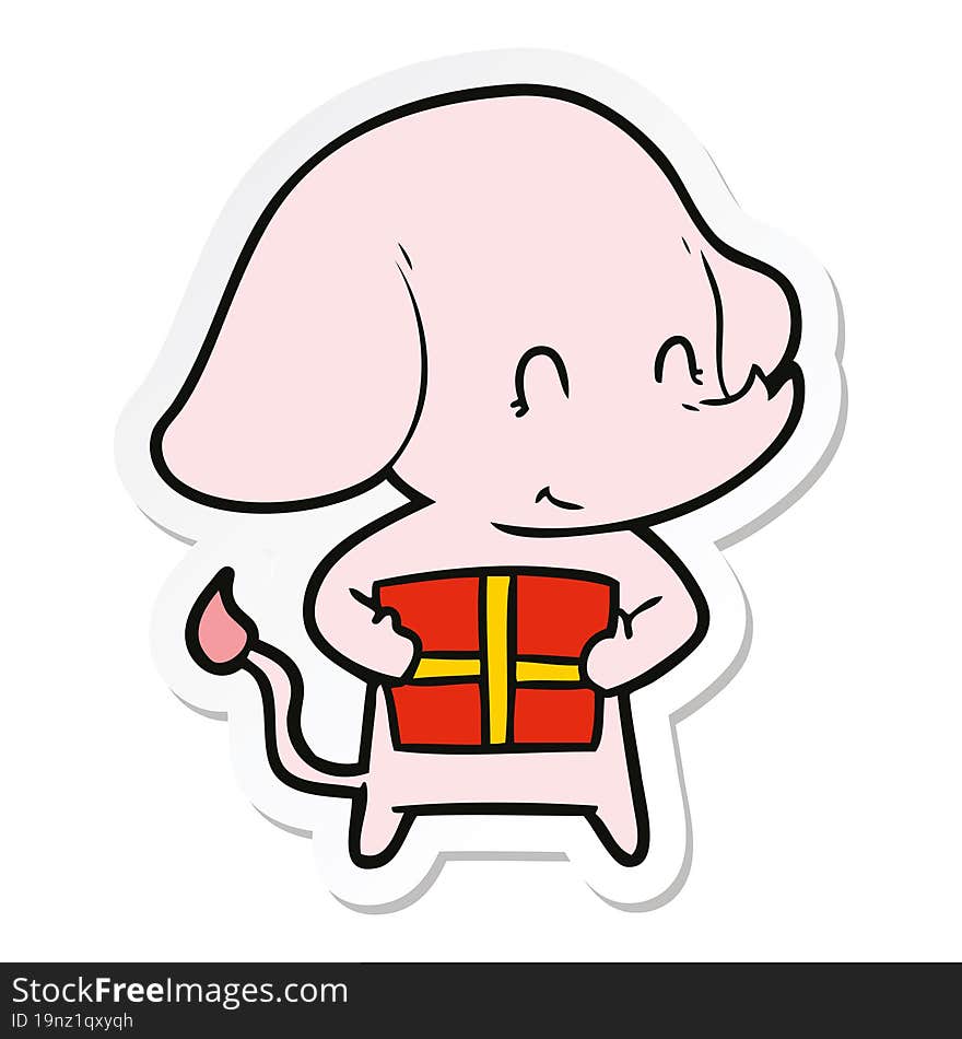 sticker of a cute cartoon elephant with present