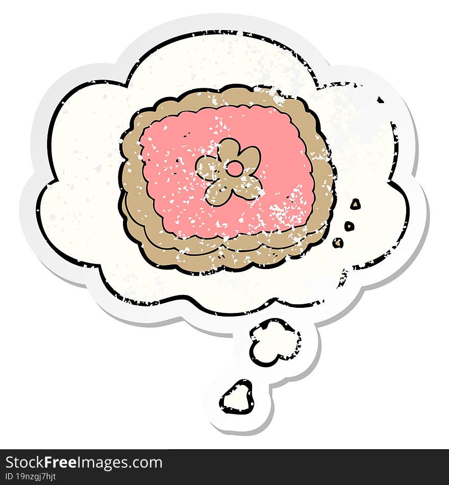 cartoon biscuit and thought bubble as a distressed worn sticker