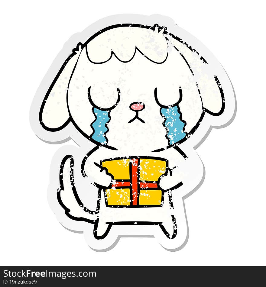 distressed sticker of a cute cartoon dog with christmas present