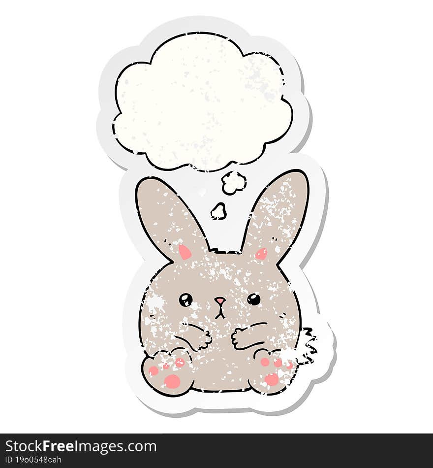 cartoon rabbit with thought bubble as a distressed worn sticker