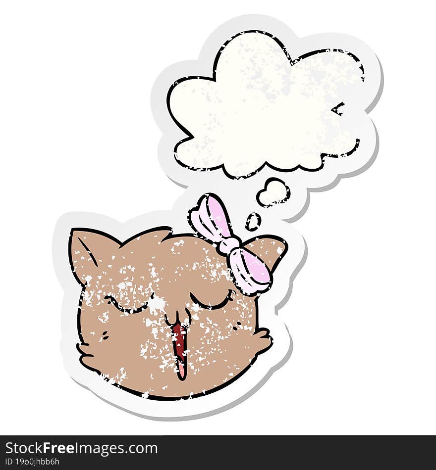 cartoon cat face with thought bubble as a distressed worn sticker