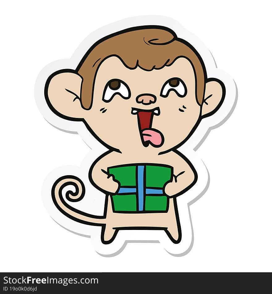 Sticker Of A Crazy Cartoon Monkey With Christmas Present