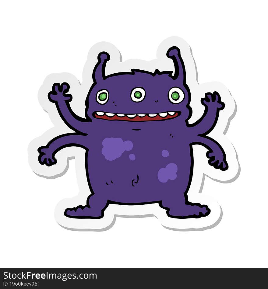 sticker of a cartoon alien monster