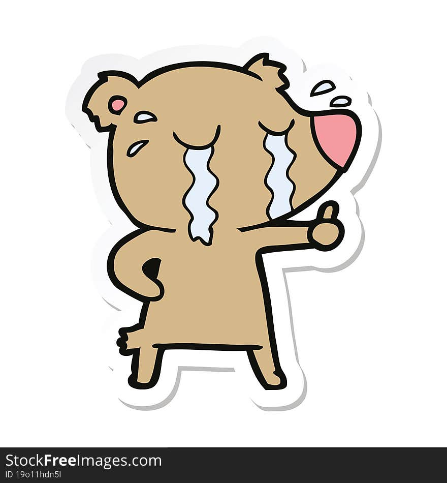 sticker of a cartoon crying bear