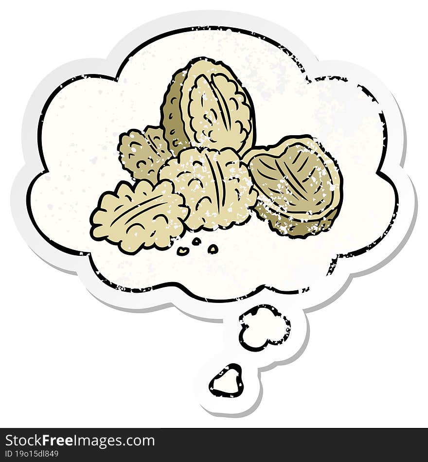 cartoon walnuts and thought bubble as a distressed worn sticker