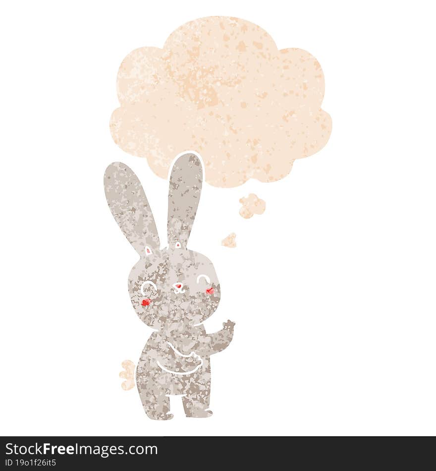 cute cartoon rabbit and thought bubble in retro textured style