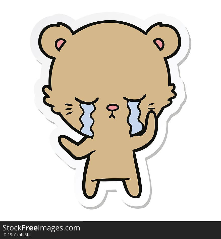 sticker of a crying cartoon bear