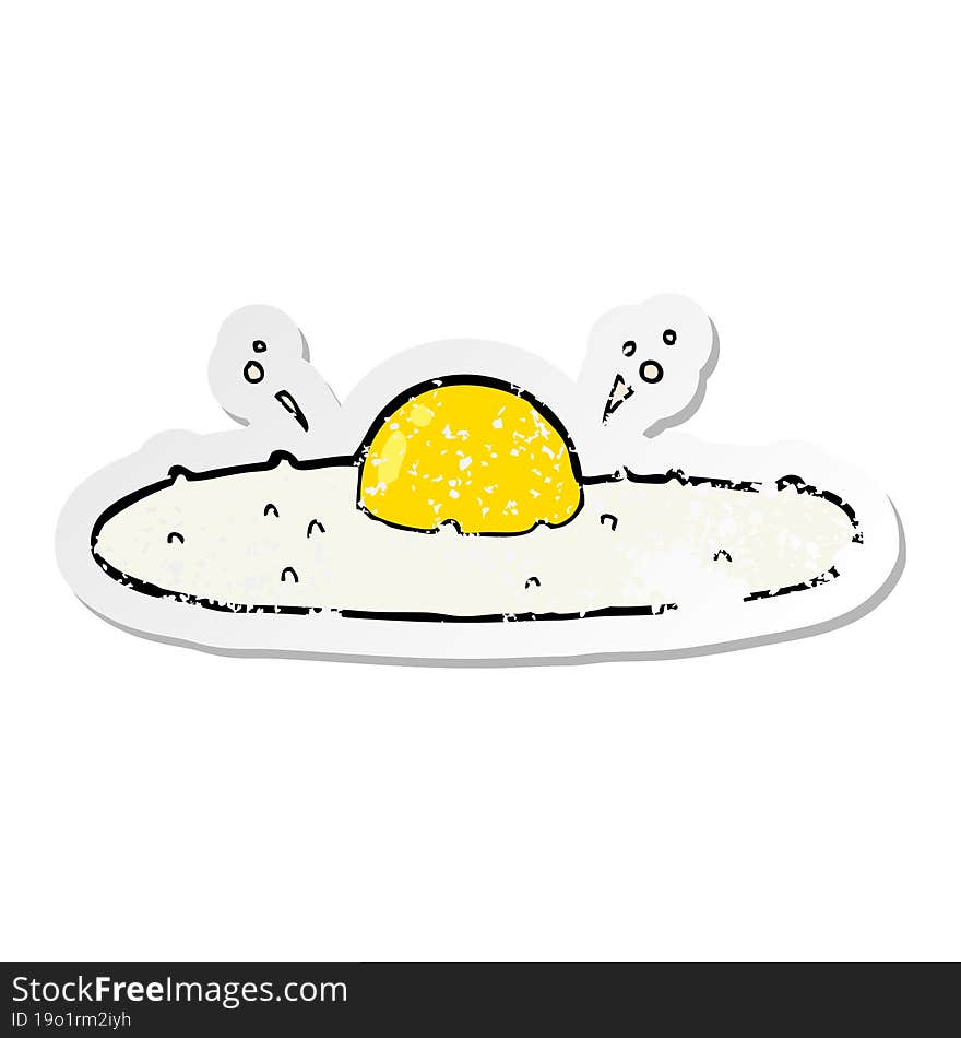 distressed sticker of a cartoon fried egg