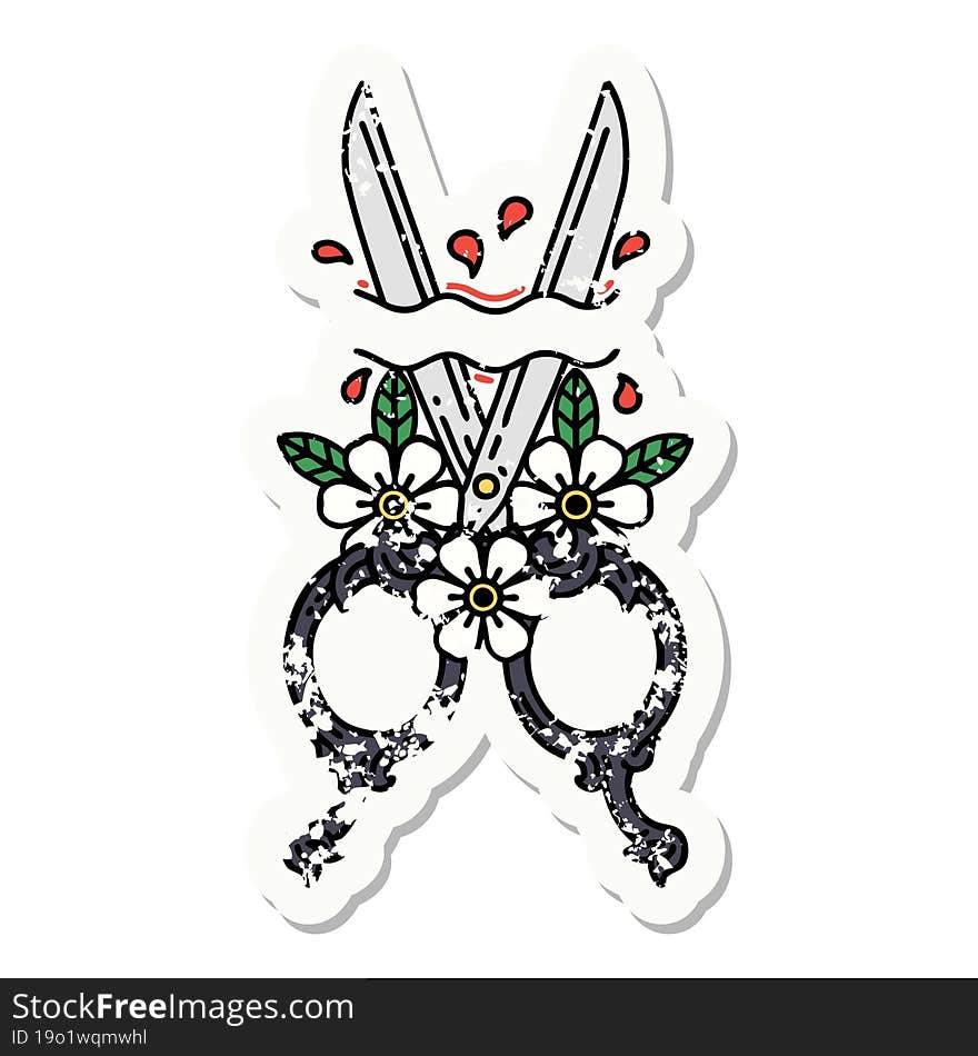 traditional distressed sticker tattoo of a barber scissors and flowers