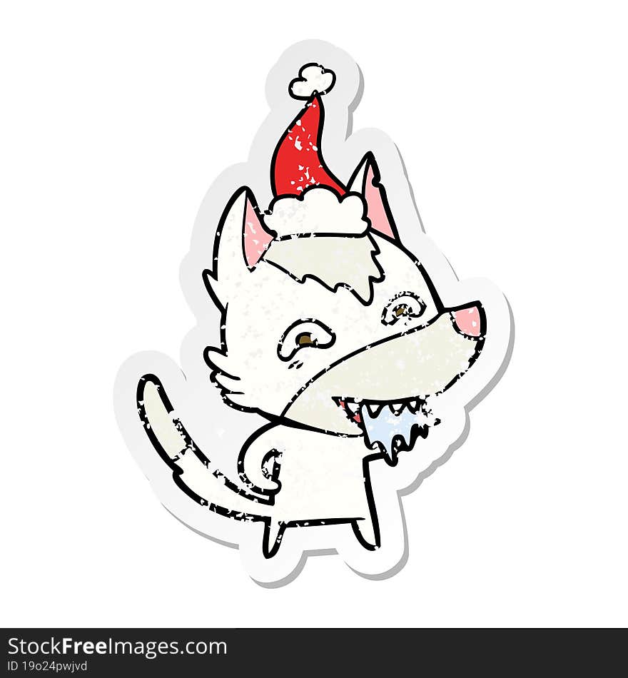 distressed sticker cartoon of a hungry wolf wearing santa hat