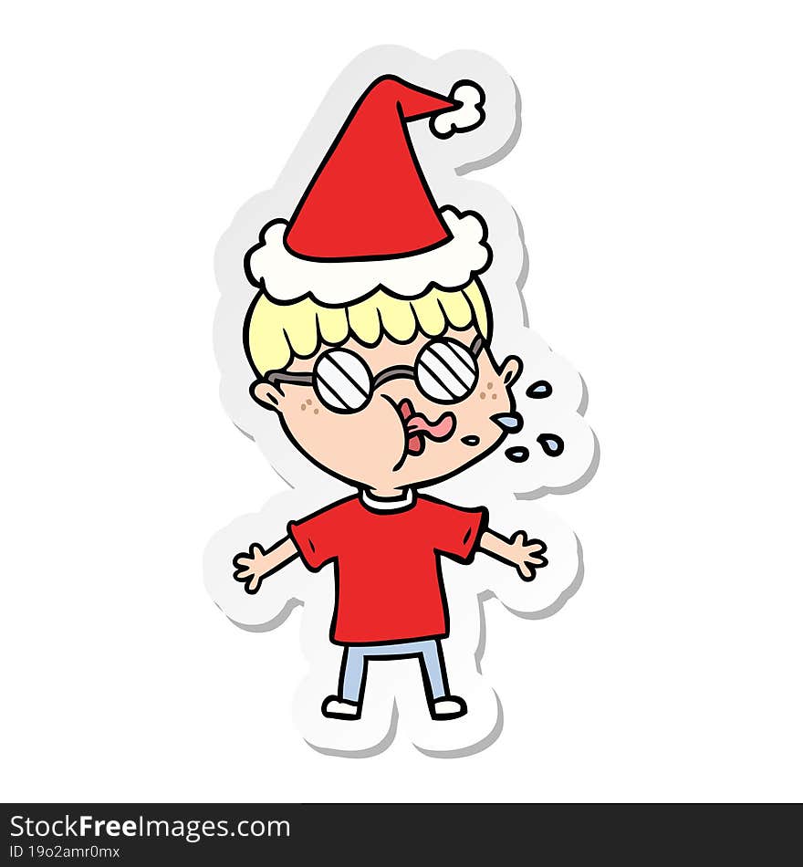 sticker cartoon of a boy wearing spectacles wearing santa hat