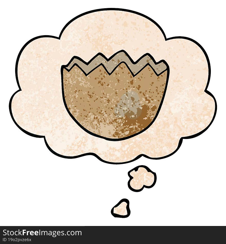 cartoon cracked eggshell and thought bubble in grunge texture pattern style