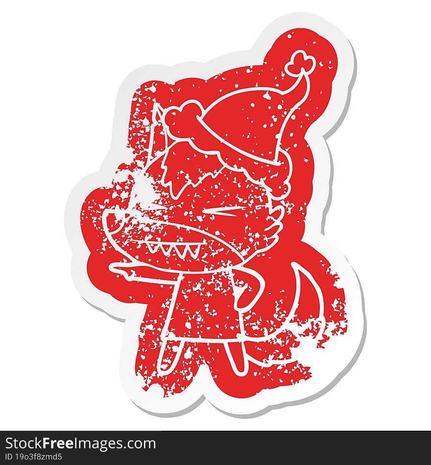 Angry Wolf Cartoon Distressed Sticker Of A Wearing Santa Hat