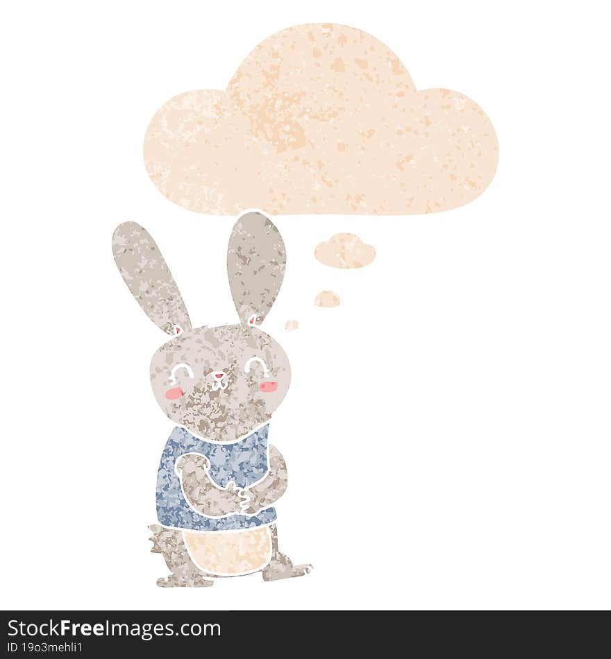 cute cartoon rabbit and thought bubble in retro textured style