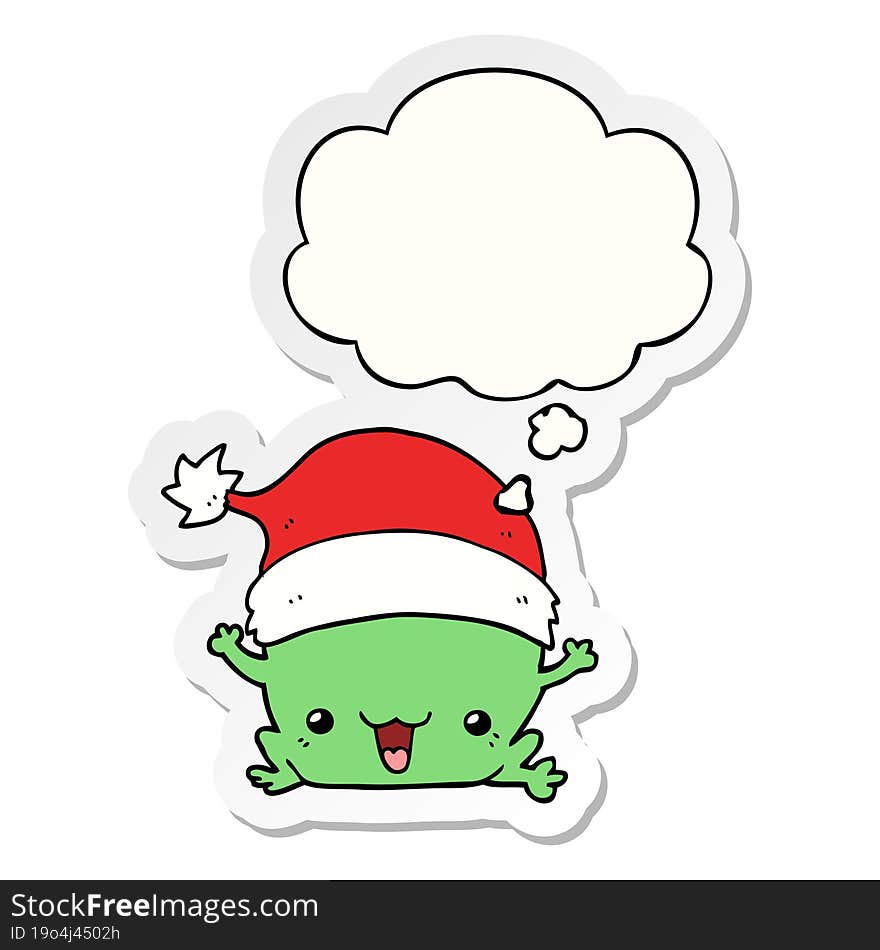 cute cartoon christmas frog and thought bubble as a printed sticker