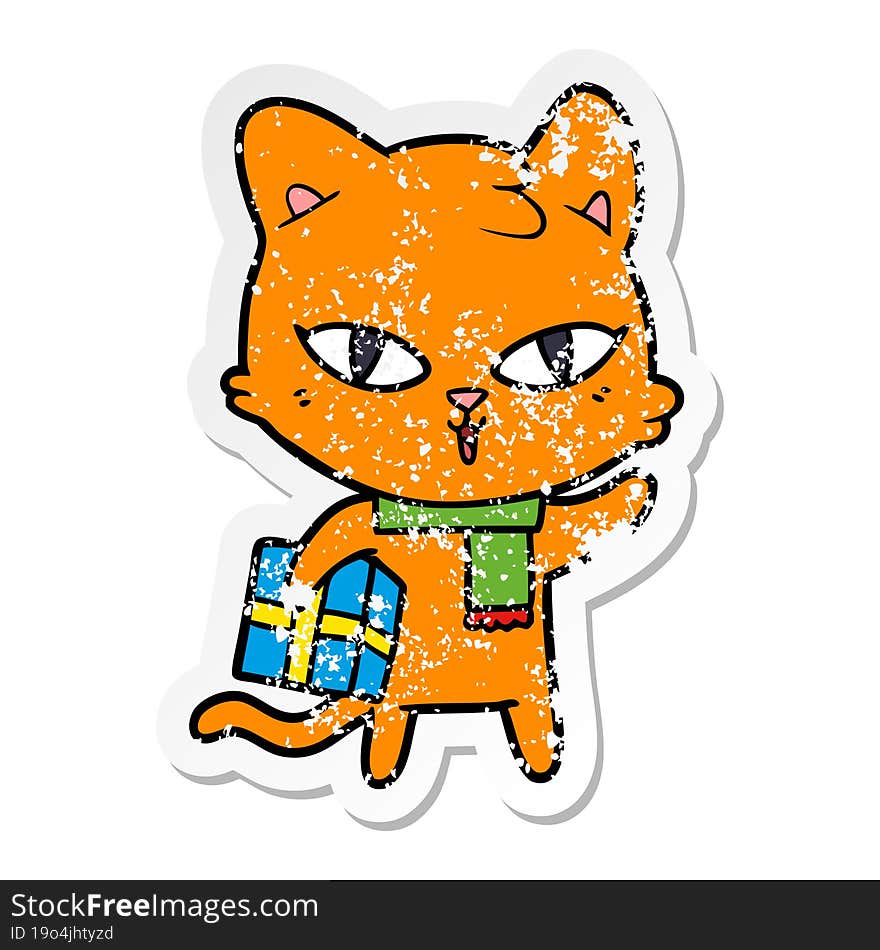 distressed sticker of a cartoon cat with a present