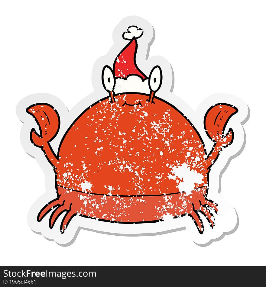 distressed sticker cartoon of a crab wearing santa hat