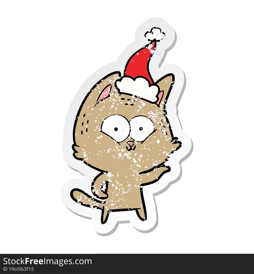 distressed sticker cartoon of a cat wearing santa hat