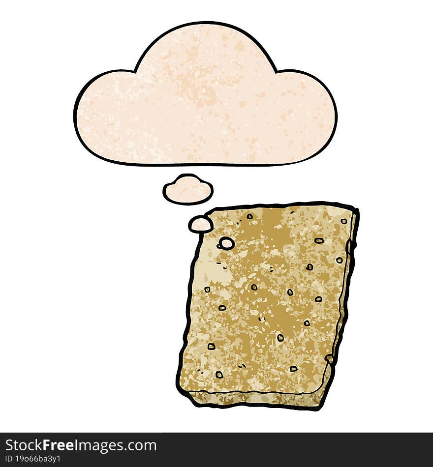 cartoon biscuit and thought bubble in grunge texture pattern style