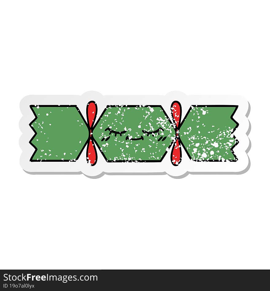 distressed sticker of a cute cartoon christmas cracker