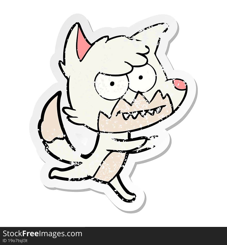 distressed sticker of a cartoon grinning fox