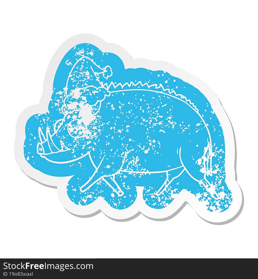 Cartoon Distressed Sticker Of A Wild Boar Wearing Santa Hat