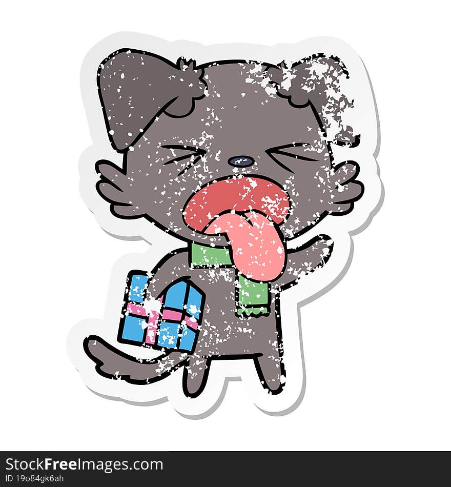 distressed sticker of a cartoon disgusted dog with christmas gift