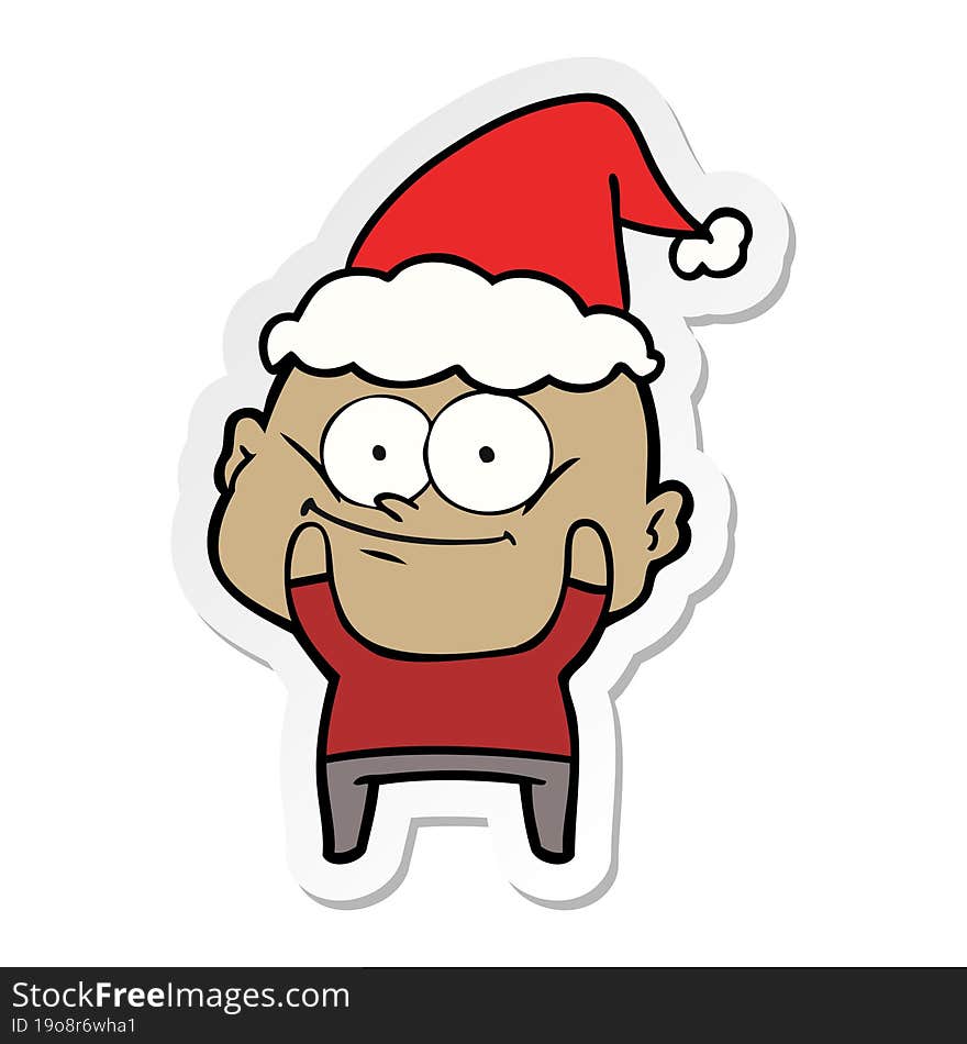 sticker cartoon of a bald man staring wearing santa hat