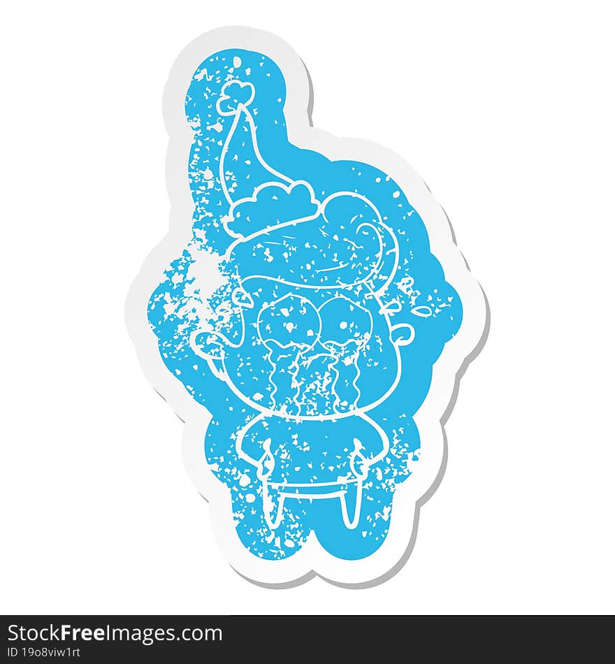 cartoon distressed sticker of a crying man wearing santa hat