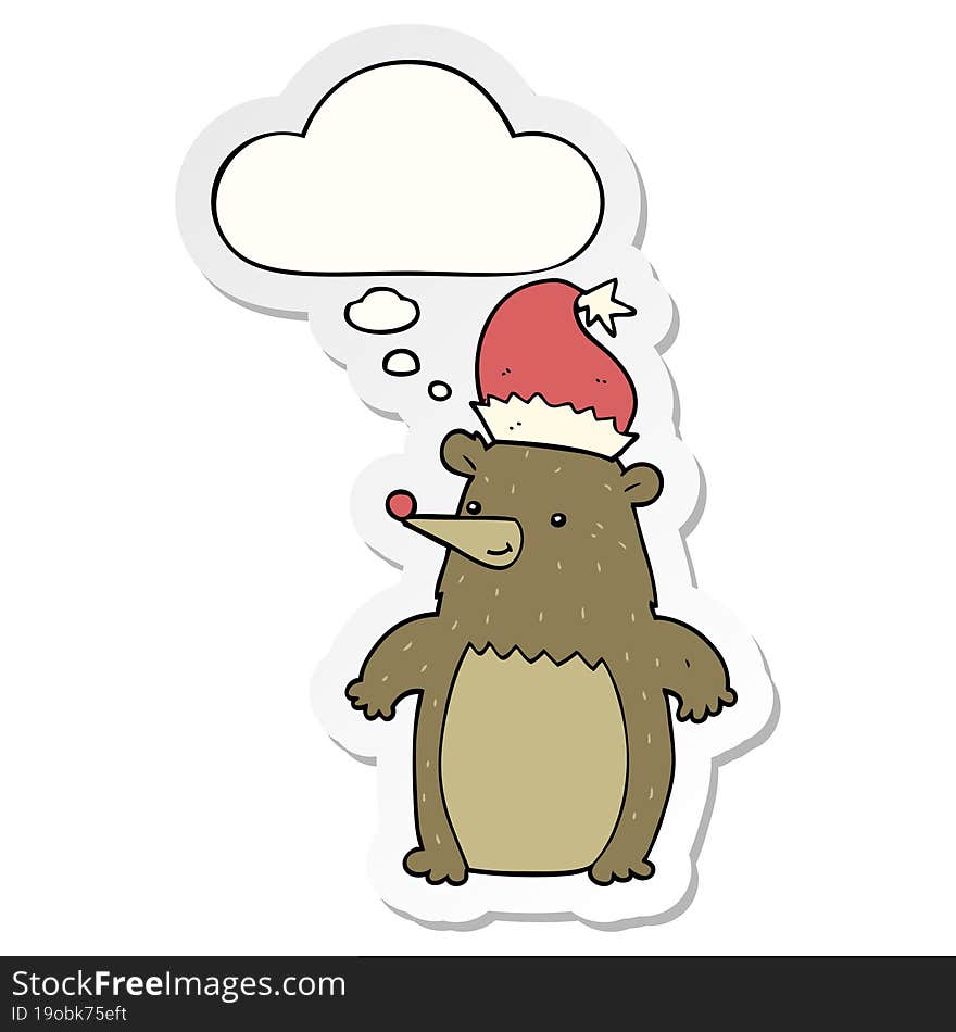 cartoon bear wearing christmas hat and thought bubble as a printed sticker