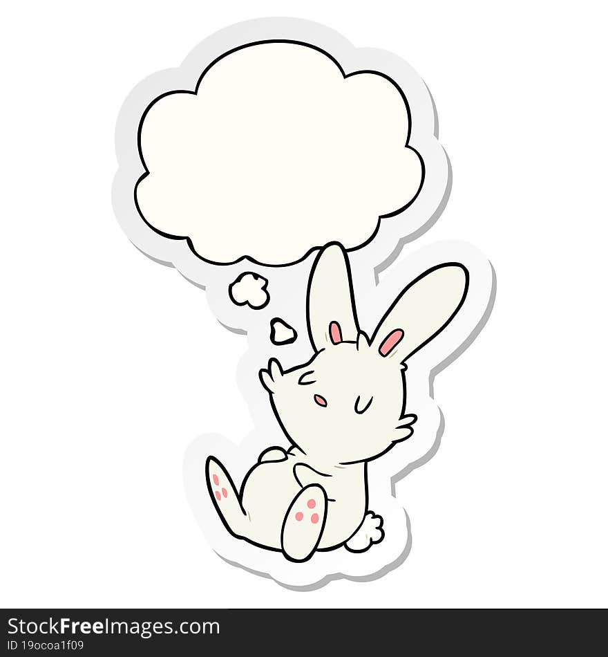 cartoon rabbit sleeping with thought bubble as a printed sticker