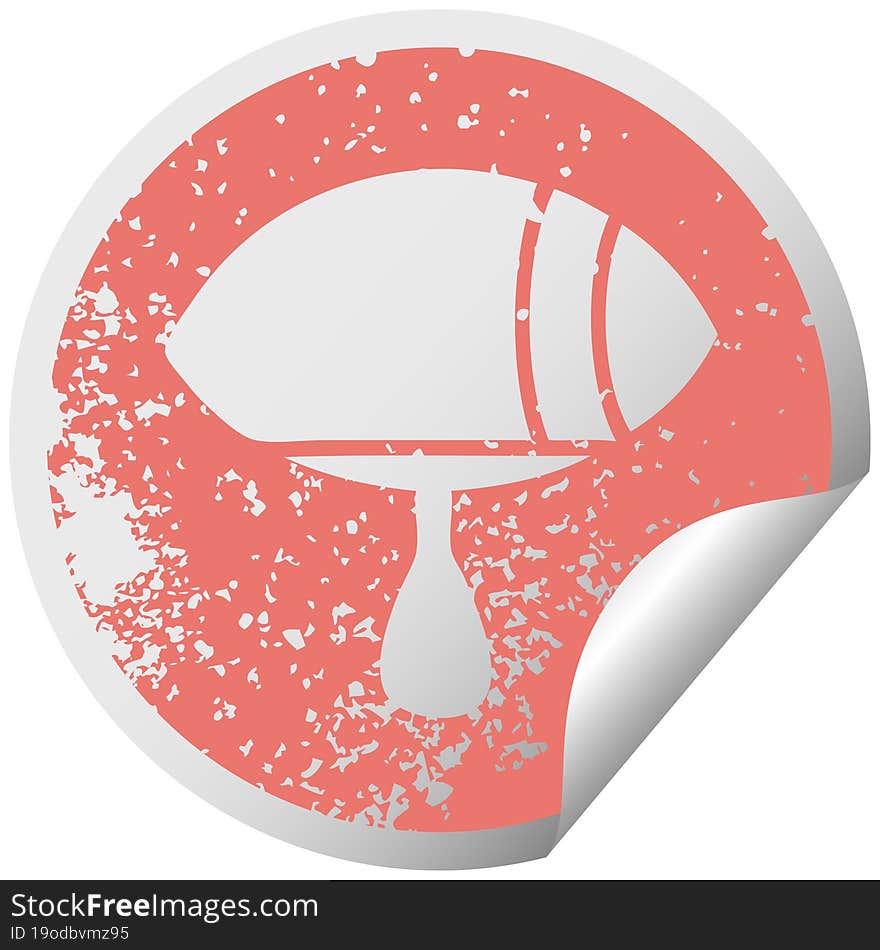 distressed circular peeling sticker symbol of a crying eye looking to one side