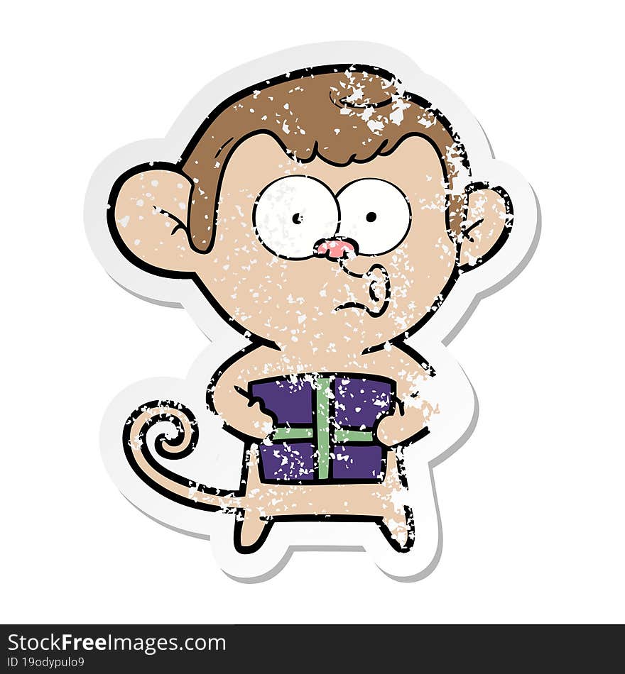 distressed sticker of a cartoon christmas monkey