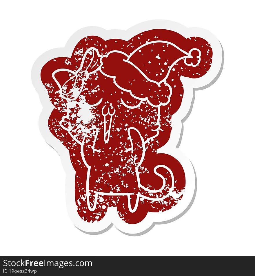 cartoon distressed sticker of a cat wearing santa hat