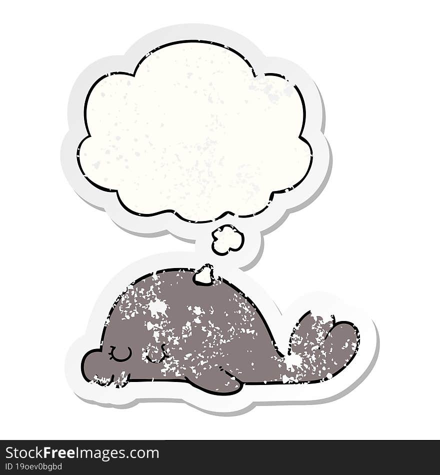 cartoon seal and thought bubble as a distressed worn sticker