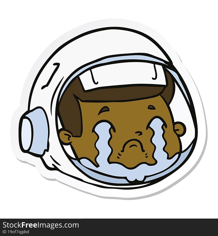 sticker of a cartoon astronaut face crying