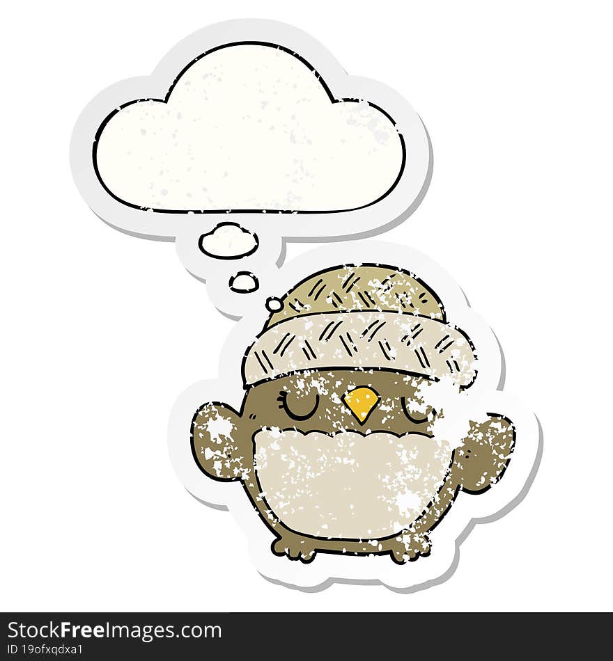 cute cartoon owl in hat and thought bubble as a distressed worn sticker