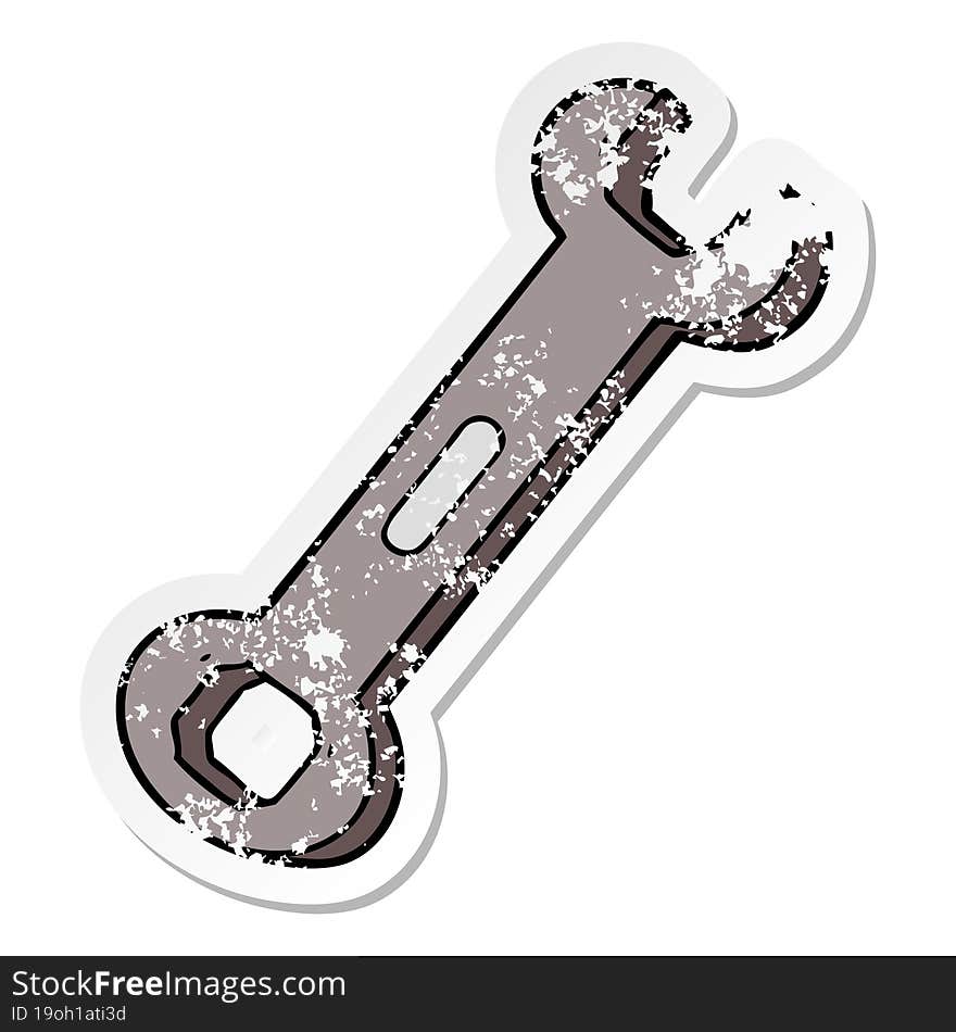 distressed sticker of a cartoon spanner