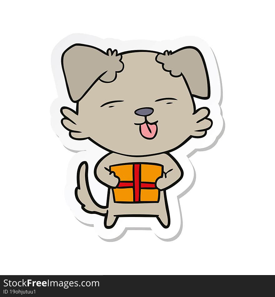 Sticker Of A Cartoon Dog With Christmas Present