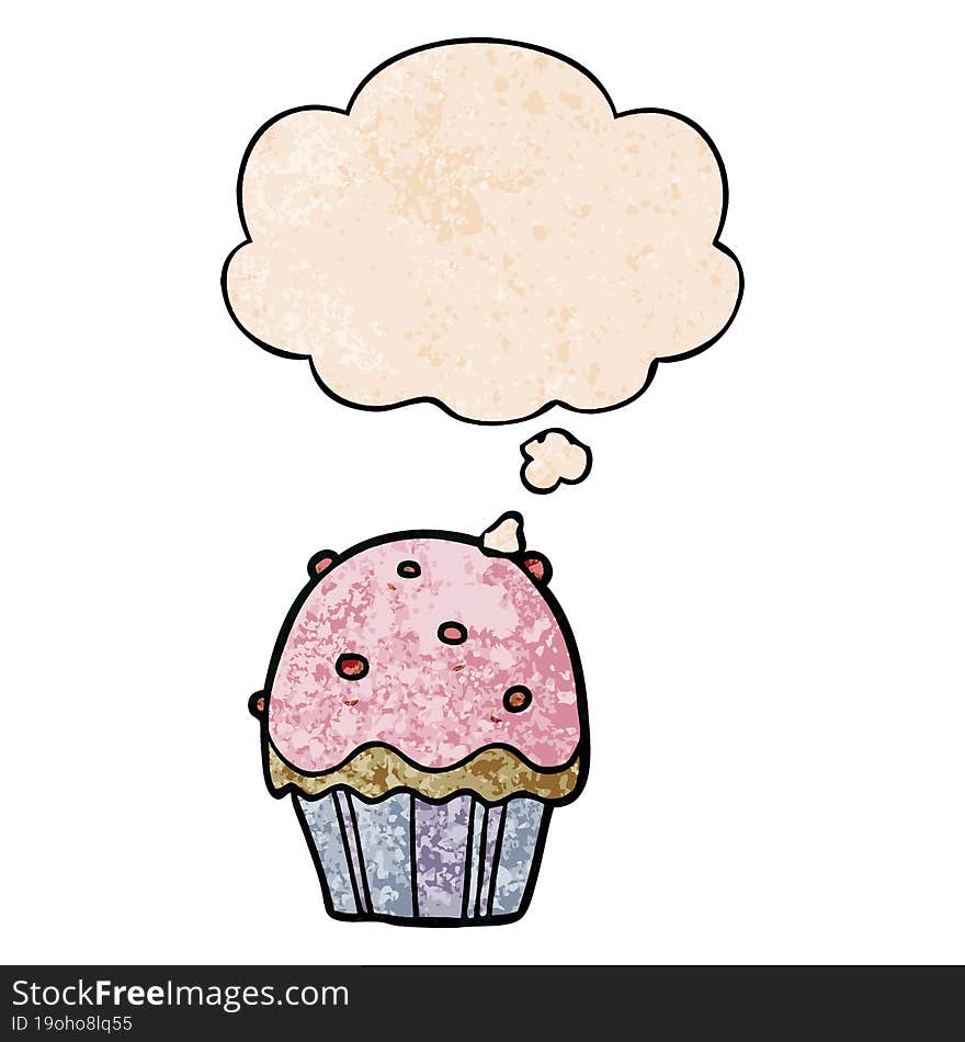 cartoon cupcake with thought bubble in grunge texture style. cartoon cupcake with thought bubble in grunge texture style