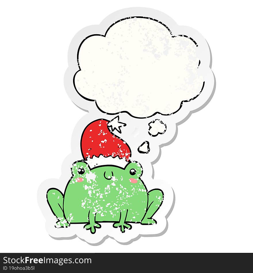 cute cartoon christmas frog and thought bubble as a distressed worn sticker