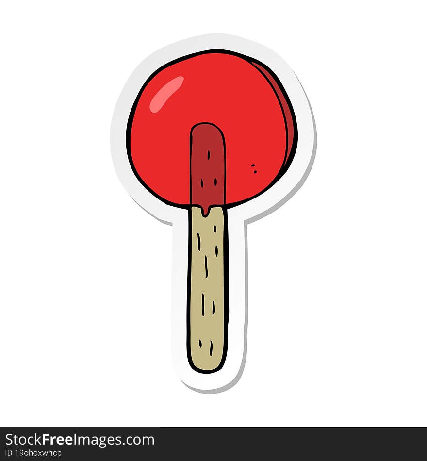 sticker of a cartoon lollipop